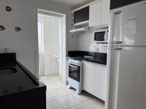 Ap com churrasqueira em Capão da Canoa