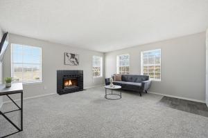 Comfortable layout with fireplace and dining area