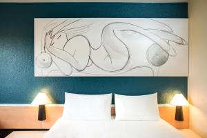 Hotels ibis Villepinte Parc des Expositions : photos des chambres