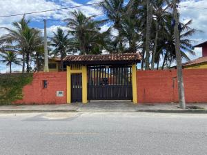 Itanhaem house in front of the beach and the Coca-Cola river