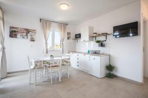 Apartmani Mariela