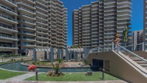 Luxury Beachfront Stay at Las Palomas A702 Phase 1 – Stunning 2BR Escape on Sandy Beach