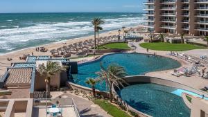 Luxury Beachfront Stay at Las Palomas A702 Phase 1 – Stunning 2BR Escape on Sandy Beach