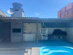 Casa com piscina 1 quadra do mar - Arroio do Sal