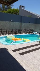 Casa com piscina 1 quadra do mar - Arroio do Sal