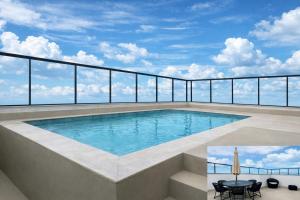 PISCINA, 2qts, 2 banh, varanda c churrasqueira, estacionamento, elevador, portaria