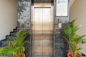 Treebo Adithi Comforts Inn And Suites