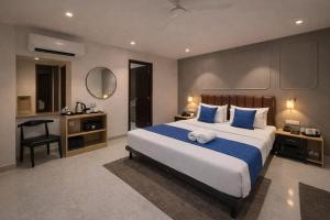 Qotel Comfort Golden Saffron - Hotel in Punjabi Bagh Near Metro