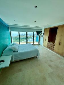 Bello apartamento dentro del Hotel Radisson Ocean Pavillion