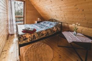 Holiday home with sauna, jacuzzi and private pond