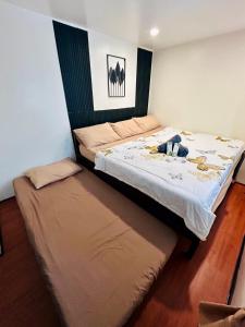 Cozy 1BR loft condo at The CY Goshenland Leonila Hill