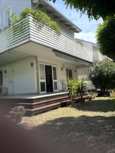 Casa con giardino