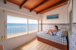 Apartamento en primera línea de playa con vistas al mar
