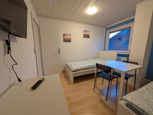 Modernes Monteurhaus - Gästehaus für bis zu 8 Personen mit eigenem Wintergarten und Carport