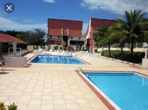 Apartamento confortável em uma vila de observadores de pássaros com vista para a lagoa!