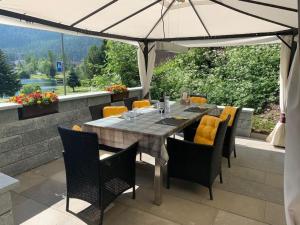 Apartment Chalet Haus am See by Interhome