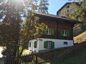 Apartment Chalet Haus am See by Interhome