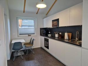 Holiday Home G20 Ferienhaus mit Wintergarten in Eckwarderhörn by Interhome