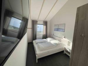 Holiday Home G5 Ferienhaus mit Garten in Eckwarderhörne by Interhome