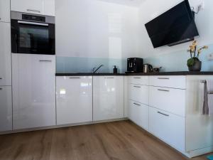 Holiday Home Ferien-Wohnung-Sartoris by Interhome