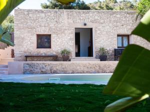 Holiday Home Villa Calyssa in Ibiza Privater Pool Meerblick by Interhome
