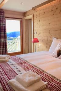 Holiday Home Chalet Le Flocon Bleu mit Blick auf das Wasser by Interhome