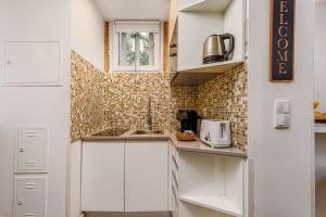 La Petite Maison Stylish Studio by Homeful Homes