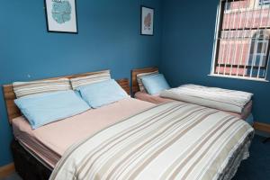 Superior Triple Room with Shared Bathroom room in Russell Scott Backpackers Hostel