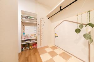 Yuka House Komagome 1階 自転車付 おもちゃと落書き壁のプレイルーム 家族向け