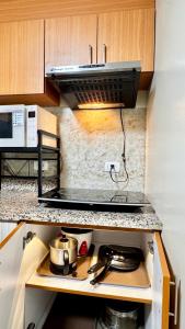 VR Homes Ortigas - 2BR Condo with Free WiFi & Netflix