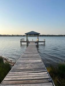 4BR Waterfront Dock + Pool Hot Tub | Walk to Beach