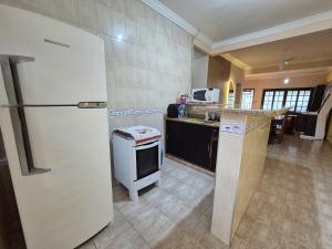 Casa de frente para o mar com piscina aquecida