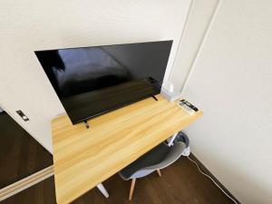 春日町 静かなマンションステイ ゆったり過ごせる一室