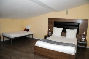 Hotels Kyriad Direct Morez : photos des chambres