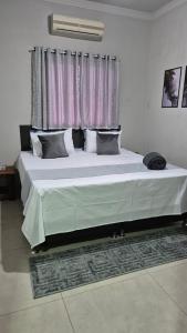 Casa com Piscina e Churrasqueira