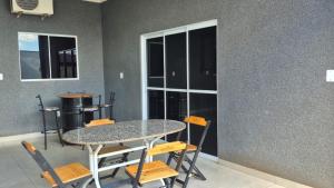 Casa com Piscina e Churrasqueira