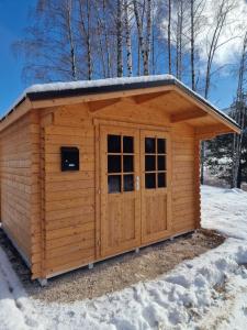 Baita Cornigol ai piedi delle Dolomiti