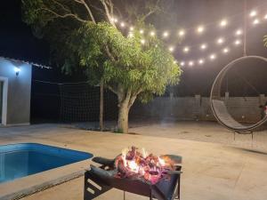 Casa com quadra de areia