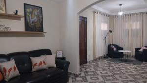 Casa espaçosa com Wi-Fi, garagem para 2 veículos e área externa em Campos dos Goytacazes