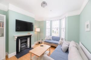 Traditional Bath House Garden with City Views
