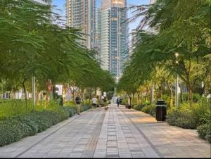 Vogue Vacation Homes, Downtown Act One near Burj Khalifa and Dubai Mall, Two Bedroom Apartment with Balcony and City Skyline View, Access toAmenities