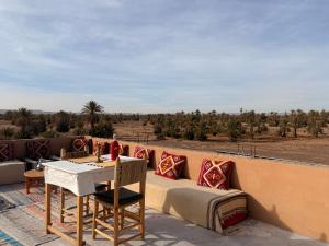 Dar Talmoudi ,Traditional Riad, Local Food, Camel , Desert Excursions