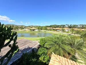 Casa com piscina priv em Condominio, vista lagoa!