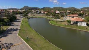 Casa com piscina priv em Condominio, vista lagoa!