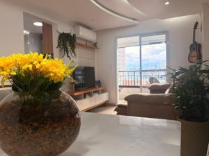 Moderno Apê à 150m da praia com churrasqueira e ar-condicionado