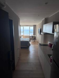 MONOAMBIENTE EDIFICIO OCEANO NECOCHEA frente al mar,