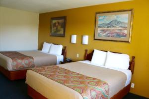 Queen Room with Two Queen Beds room in Budget Inn