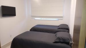 Apartamento 3 Quartos Alto Padrão Praia do Morro, vista para o mar e para as montanhas