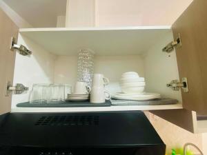 Easily Accessible Cozy Condo Near Mactan Airport, Work with Fast WiFi Speed, Spacious, Relaxing Stay