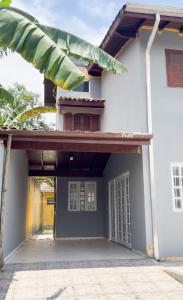 Casa a 700 metros da praia com churrasqueira e wifi